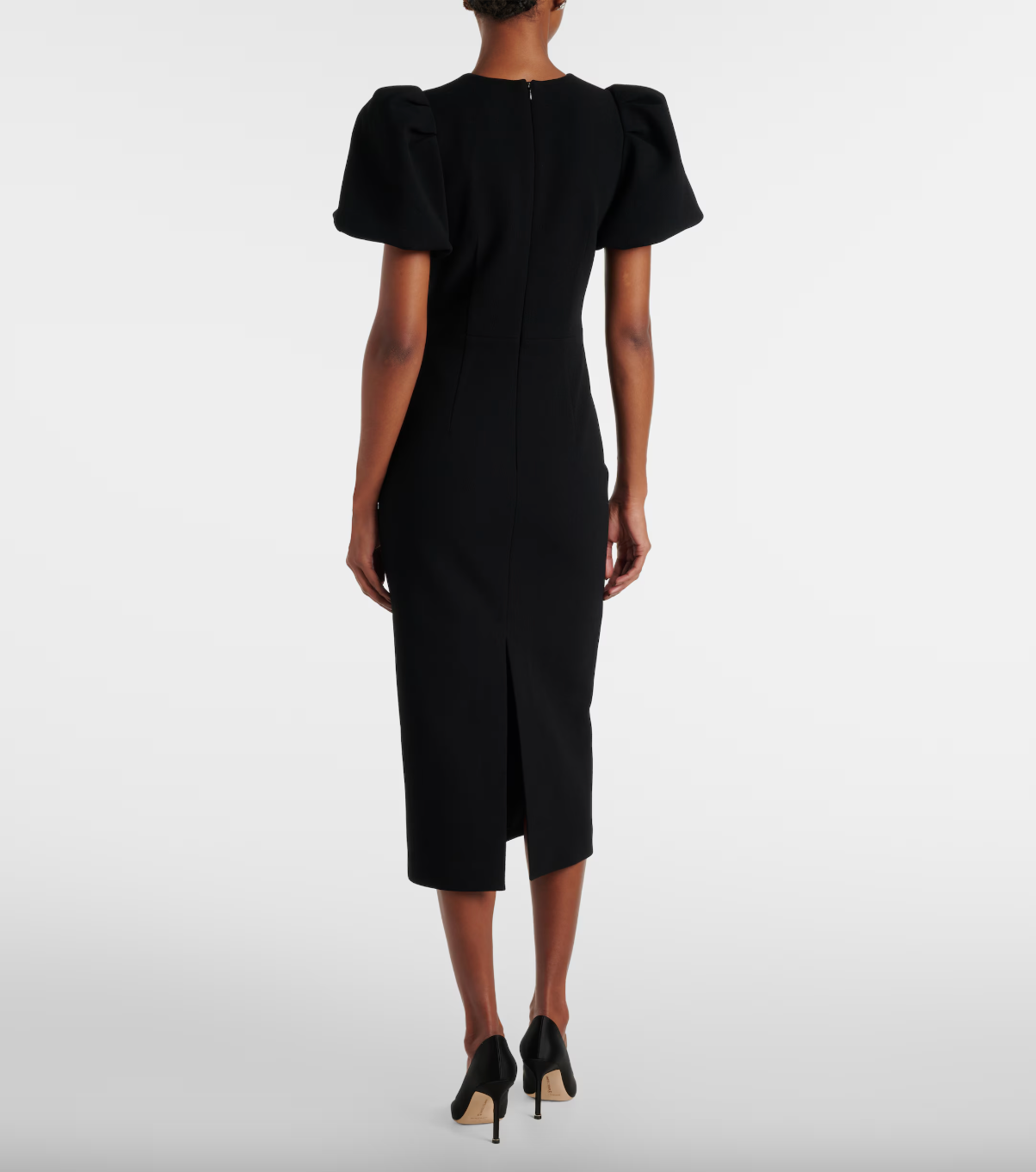 Back view of the Eliana Puff Sleeve Midi Dress by Rebecca Vallance, showcasing the fitted pencil midi skirt with a back split and a zip fastening